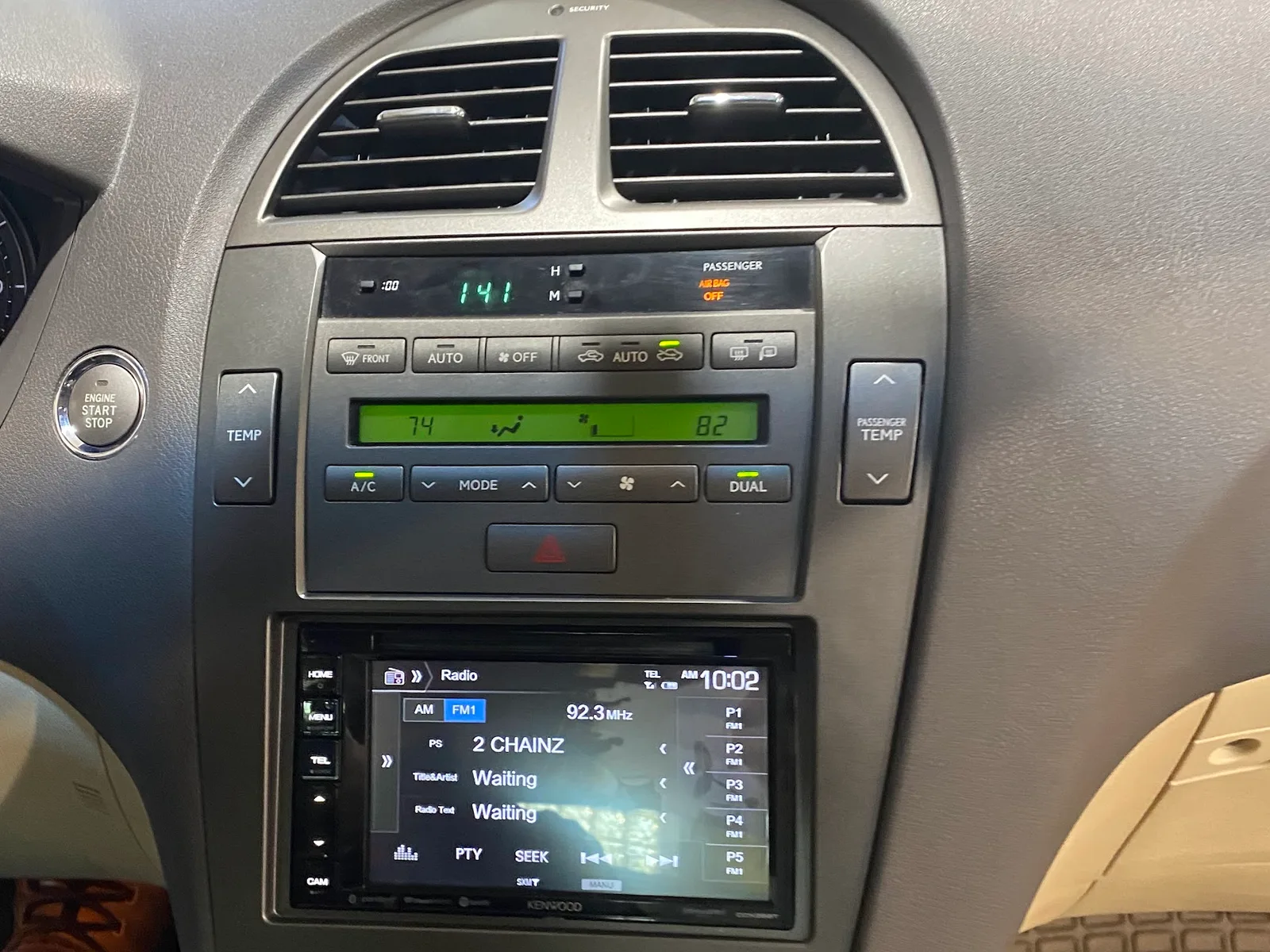 Aftermarket touchscreen head unit fitted into a factory dashboard at the MES shop