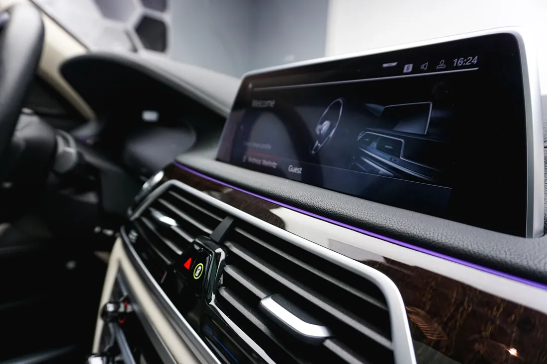 Wide touchscreen display set into a car dashboard